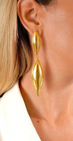 Load image into Gallery viewer, Elegant Alban Earrings in 24k gold plate worn on ear.