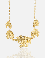 Cargue la imagen en el visor de la galería, 24K gold plated Leafs Necklace with delicate leaf accents.
